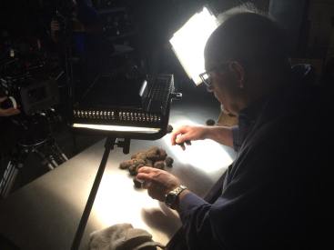 Tough work, but someone has to set up the shot and that requires every truffle be inspected prior to going on set.